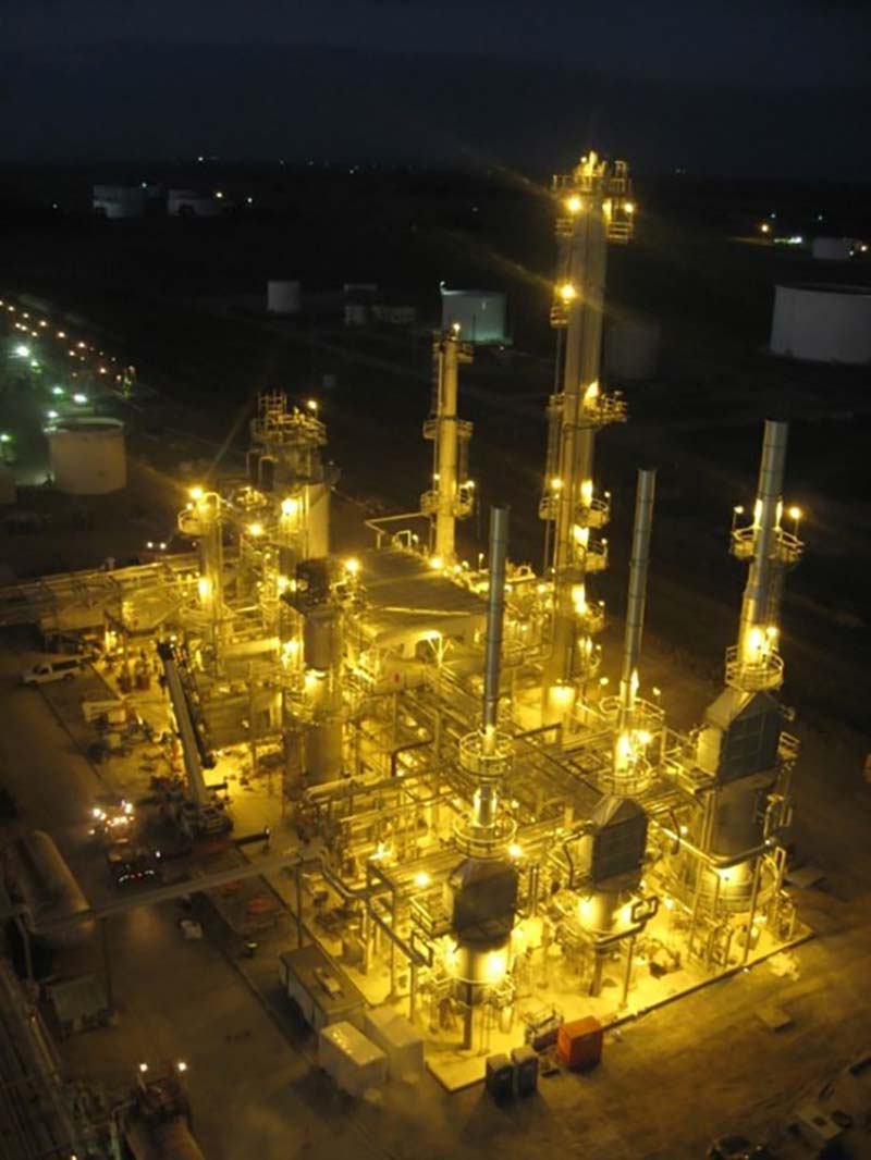 The Prime-G+ FCC Gasoline Hydrotreater designed by KP Engineering lit up at night